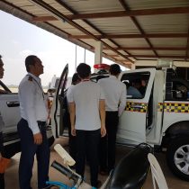 Various trainees wait to get to use the system in the newly acquired vehicle