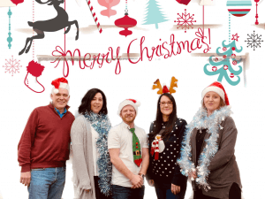 Merry Christmas graphic with Scarecrow team below in festive costumes.