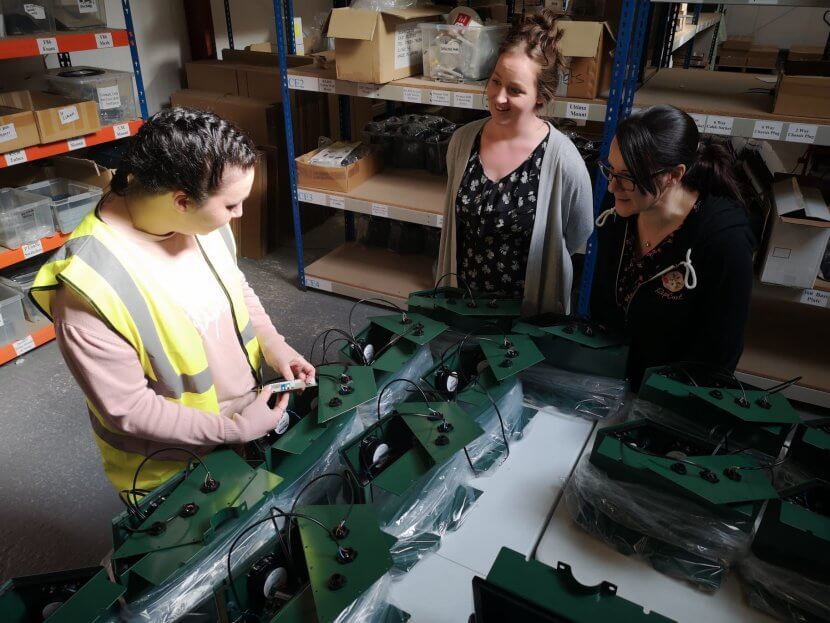 Green bio-acoustic bird deterrent devices in construction at Scarecrow warehouse.